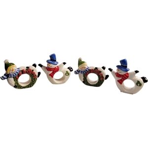 Wang's Intl napkin rings set ceramic snowmen skaters holiday
